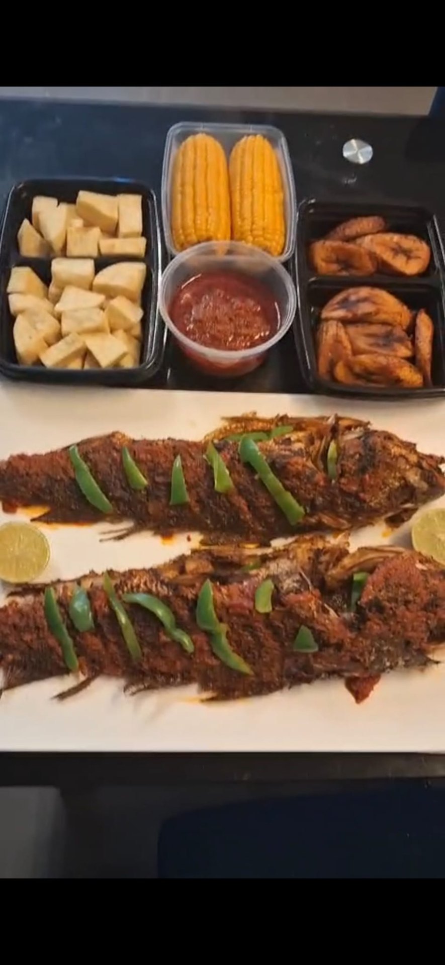 Olu Delicious — Grilled fish platter with sides
